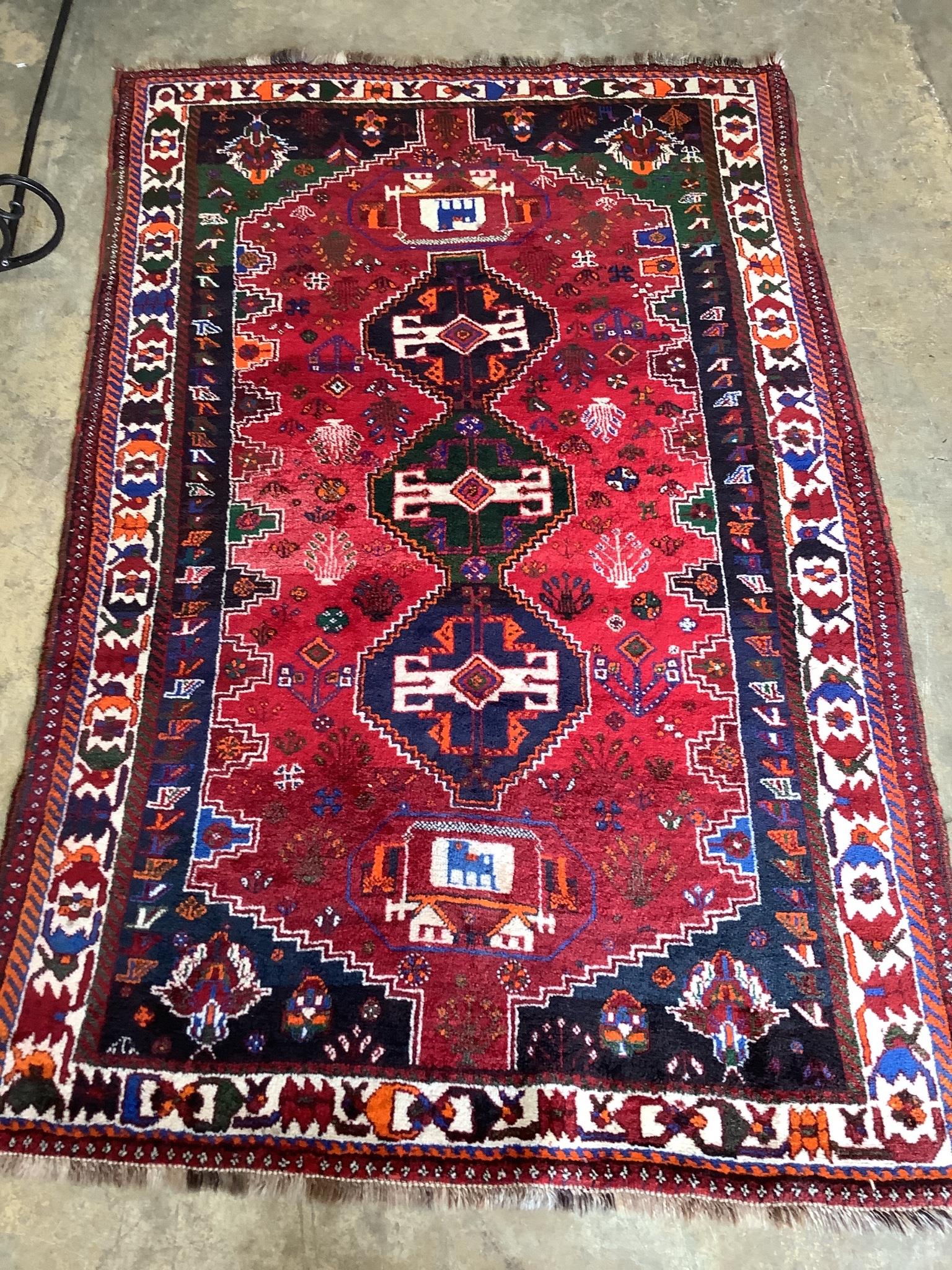 A North West Persian red ground carpet, 250 x 160cm